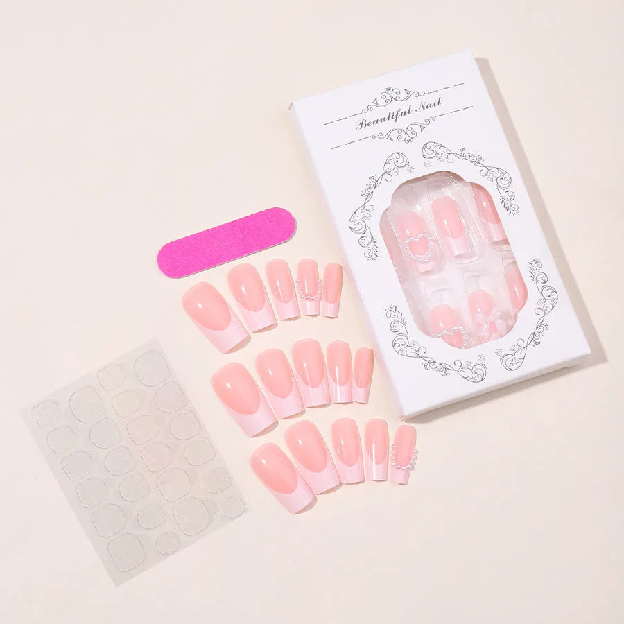 French Love Pearl fake nails set showing 24 artificial nail stickers with love pattern