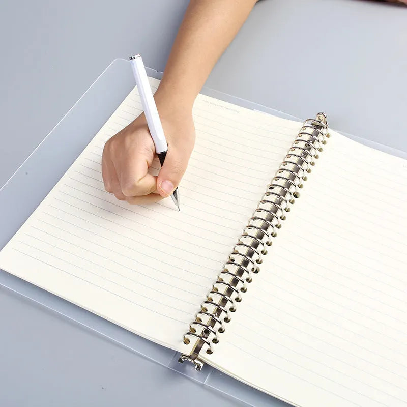 A5 26-hole binder notebook with PP matte cover showing two-ring binding mechanism and horizontal lined pages