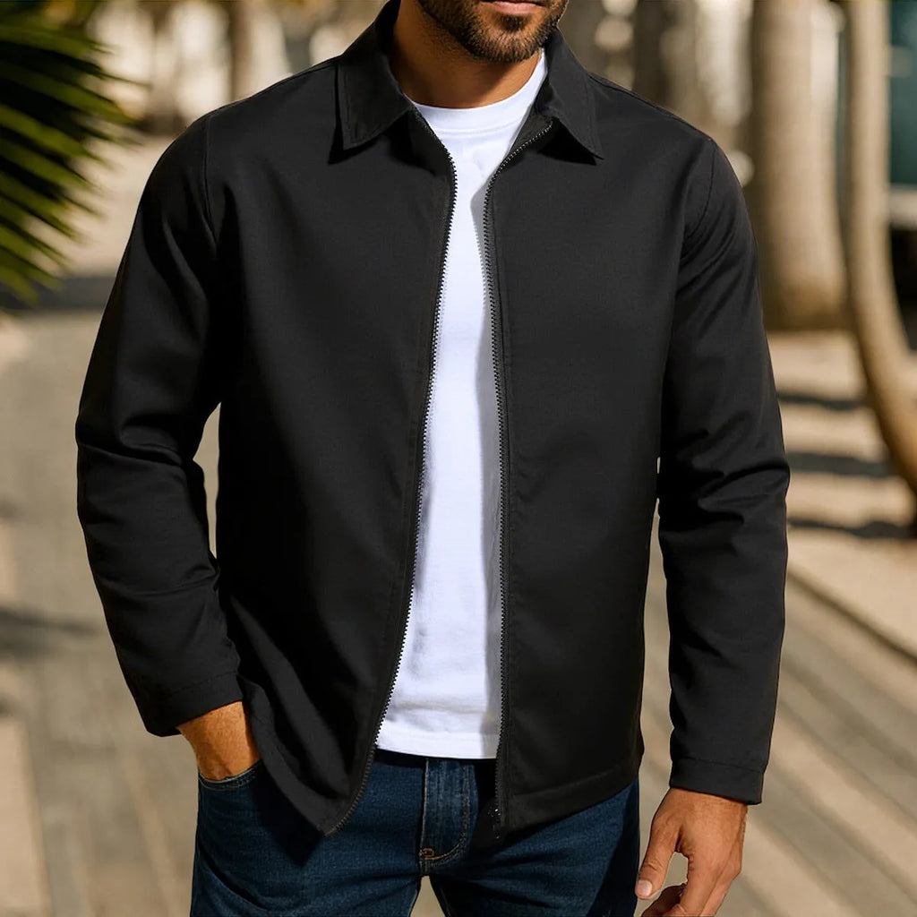 Man wearing a green zip-up cardigan jacket with raglan sleeves on a casual day out.