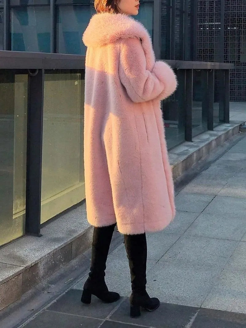 A grey women's thick faux rabbit fur coat with a fur collar, shown mid-length.