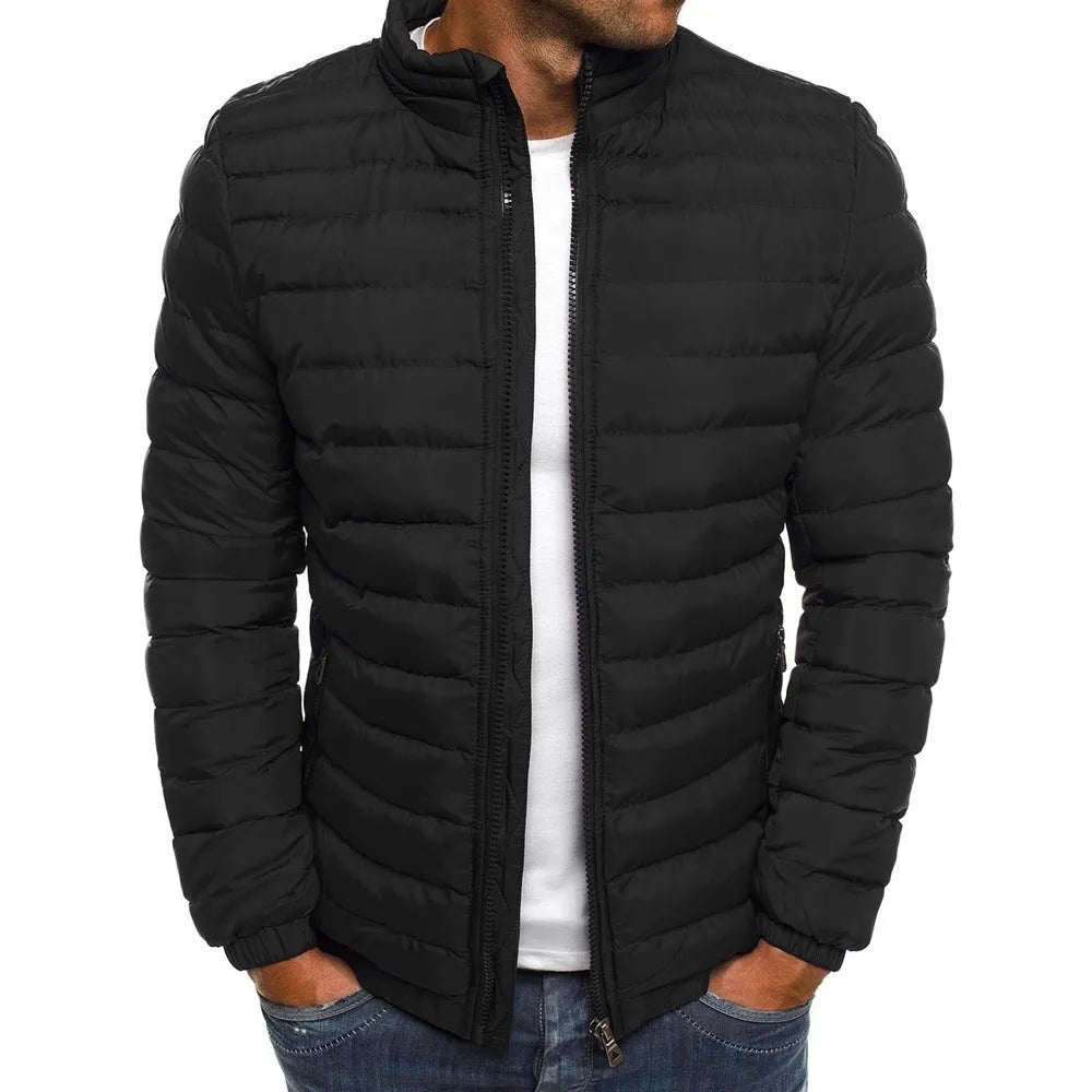 Men's thickened padded jacket with full-length zip, zipped pockets, and solid colour design in gray, black, or navy blue.