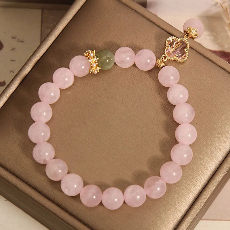 Pink crystal four-leaf clover pendant women's bracelet with alloy inlay and rhinestone details