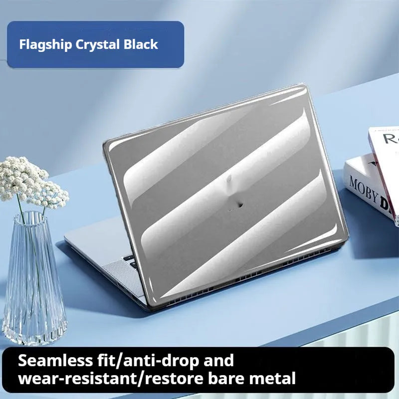 Transparent protective shell for MacBook Pro and Air laptops on a table