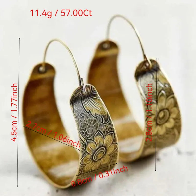 Gold geometric earrings with hollow petal pattern design