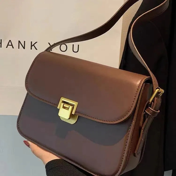 Women's soft PU leather cross-body bag in horizontal square shape showing texture detail and colour options