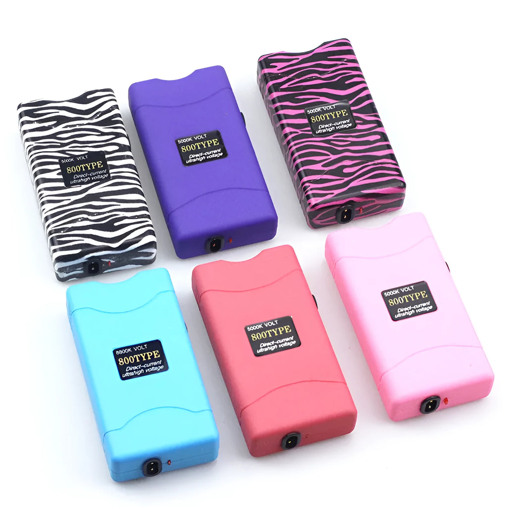 Female self-defence multi-function flashlight in plastic resin construction showing colour options