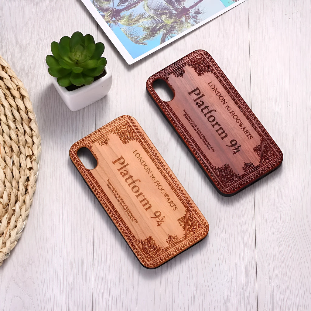 Wooden iPhone case with laser-carved cartoon animal design and TPU bumper in rosewood colour.