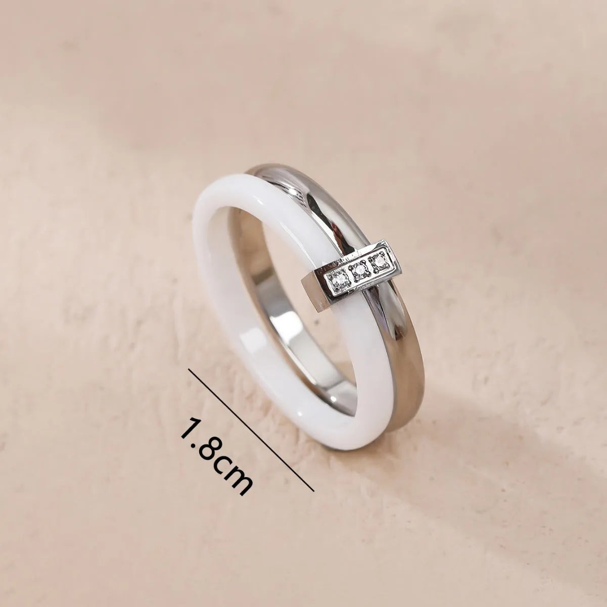 Women's titanium steel heart-shaped double ring with glossy stitching and inlaid zirconium detail.