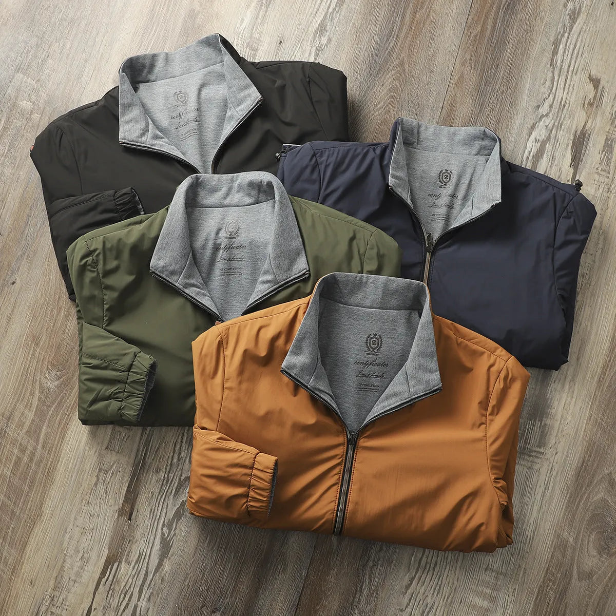 Man wearing a simple stand collar casual jacket in army green, showing the regular fit and cotton lining.