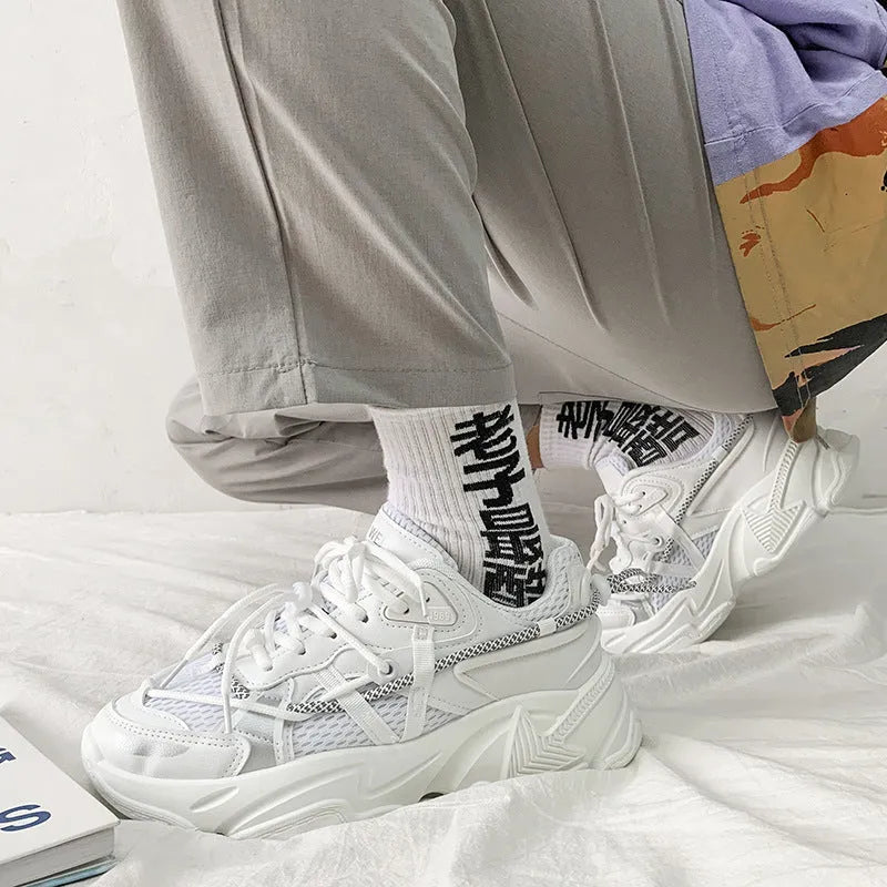 Men's white Korean-style platform dad shoes with thick sole and lace-up front on a plain background