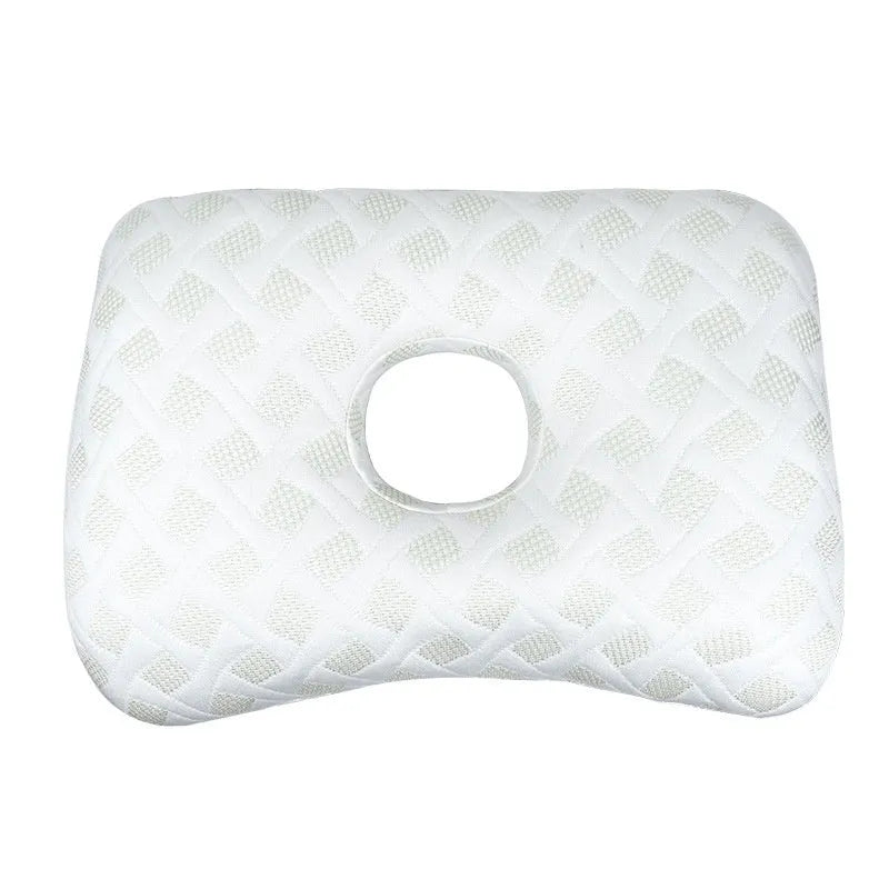Beauty salon single hole ear pillow in Boer Grey colour on a treatment bed.