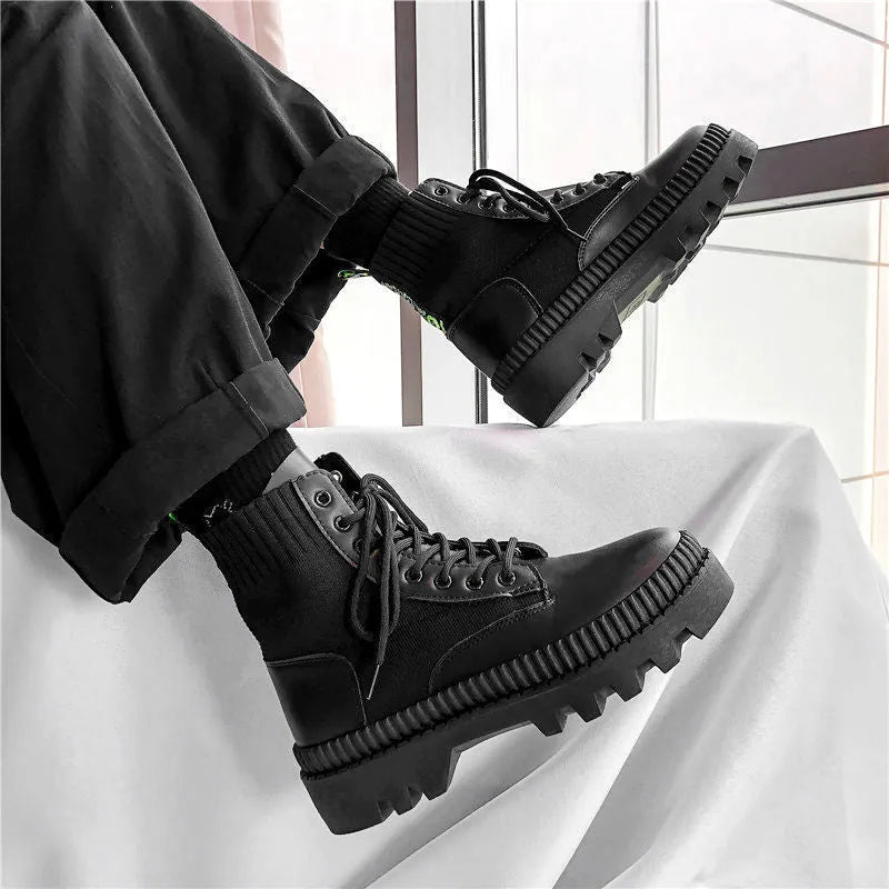 Men's black Dr Martens platform ankle boots with a side zip and frosted leather uppers.