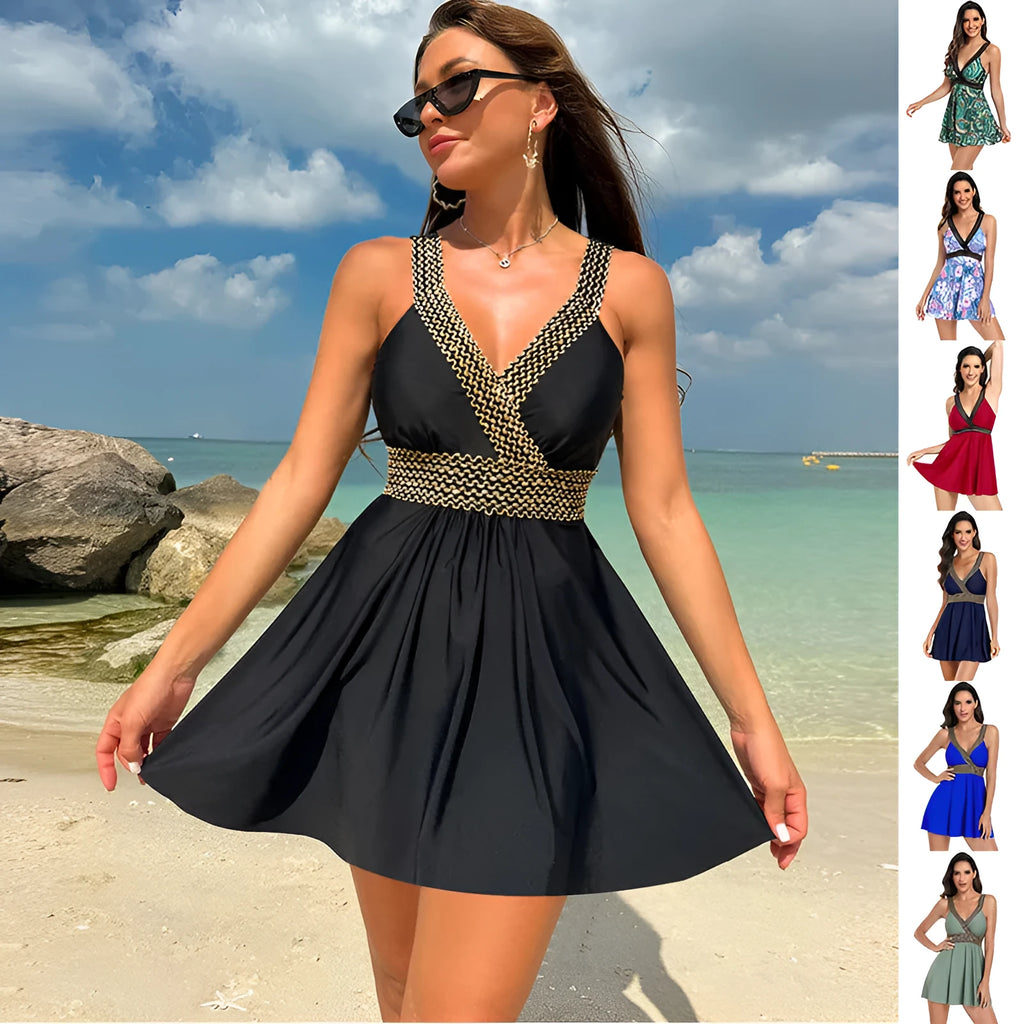 Woman wearing a printed V-neck swimsuit cover-up dress at the beach.
