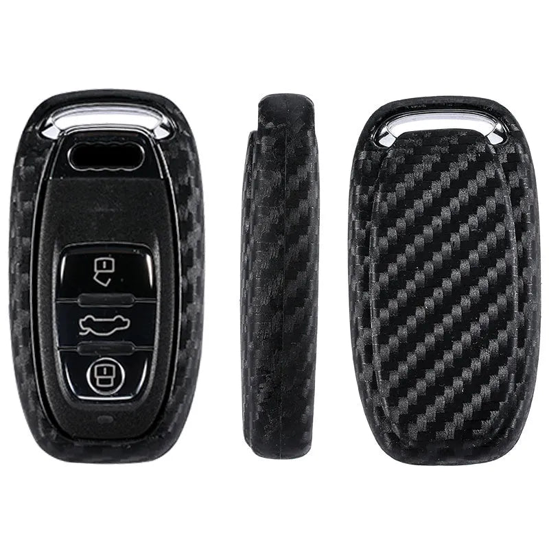 Carbon fibre silicone car key case in round button, single key or square key style, shown as a protective cover for car keys