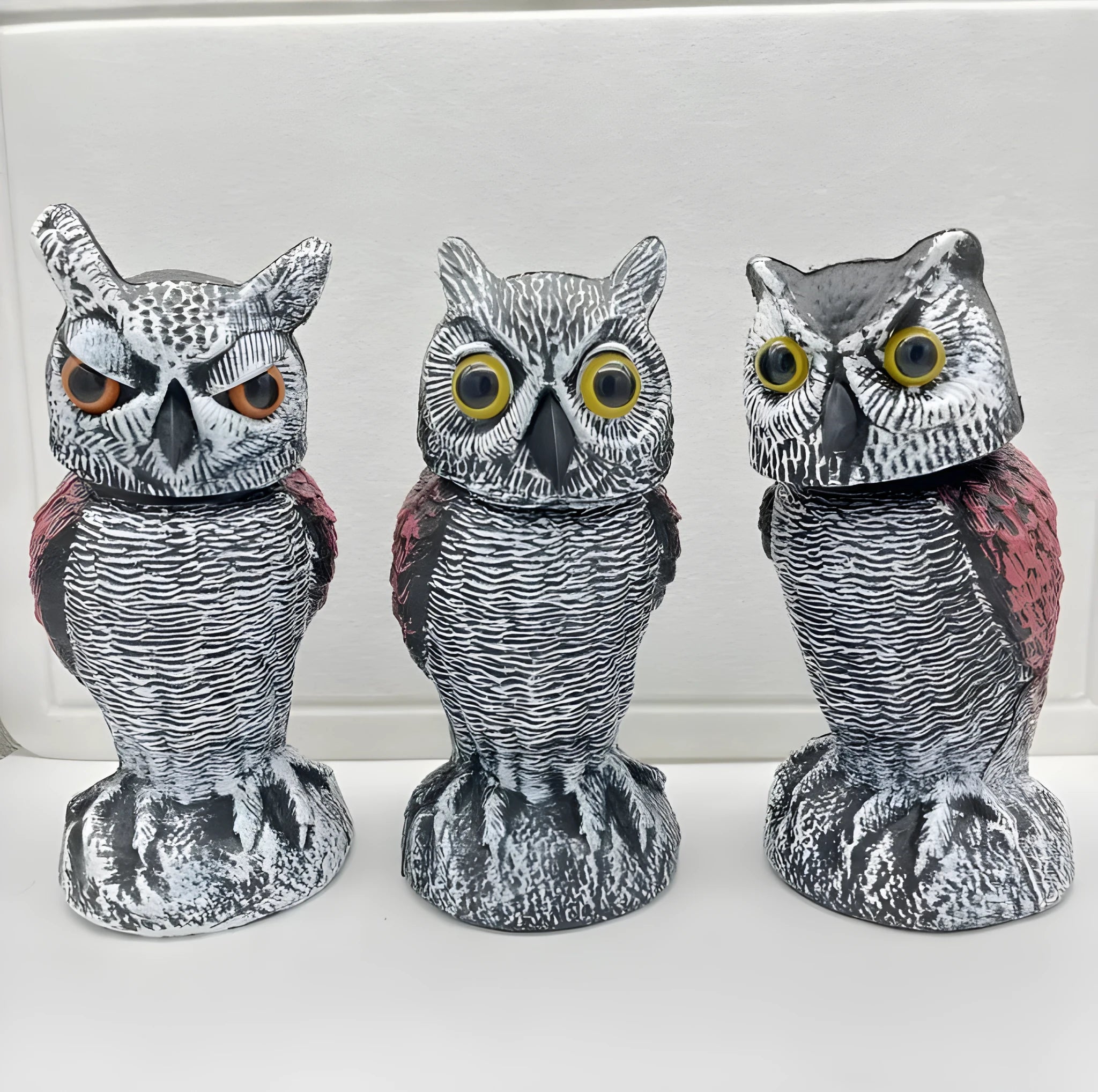 Artificial owl bait ornament with shaking head mechanism for outdoor bird deterrent