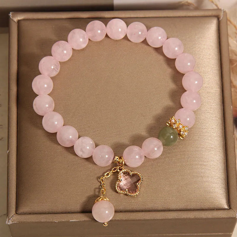 Pink crystal four-leaf clover pendant women's bracelet with alloy inlay and rhinestone details