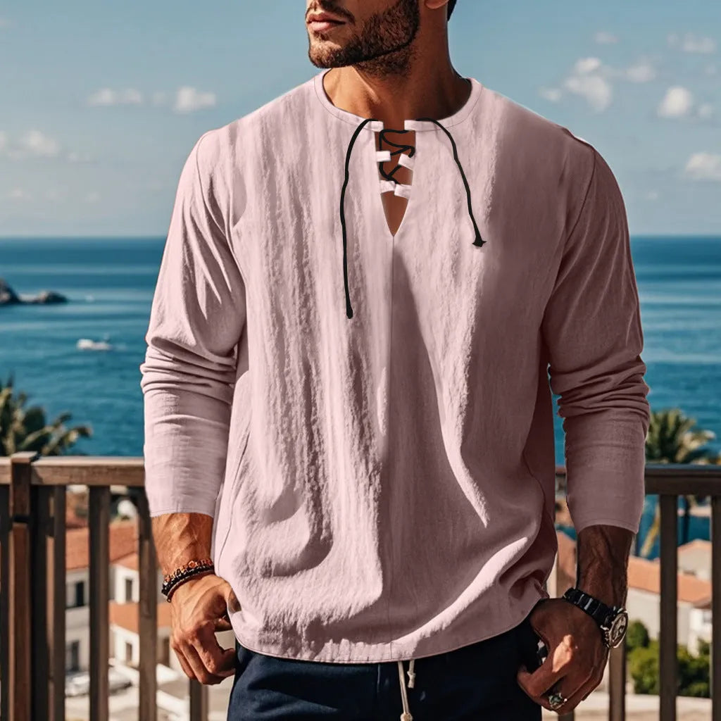Solid colour cotton linen beach ruff shirt in a loose pullover style.