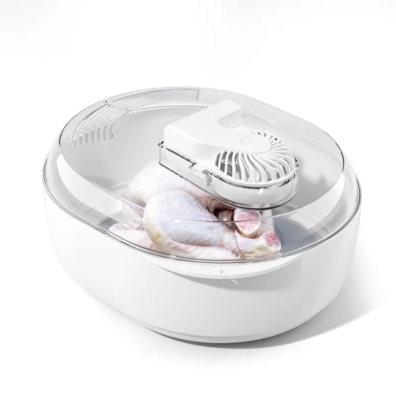 Aluminium household quick defrosting plate and separate USB cable on a kitchen counter.