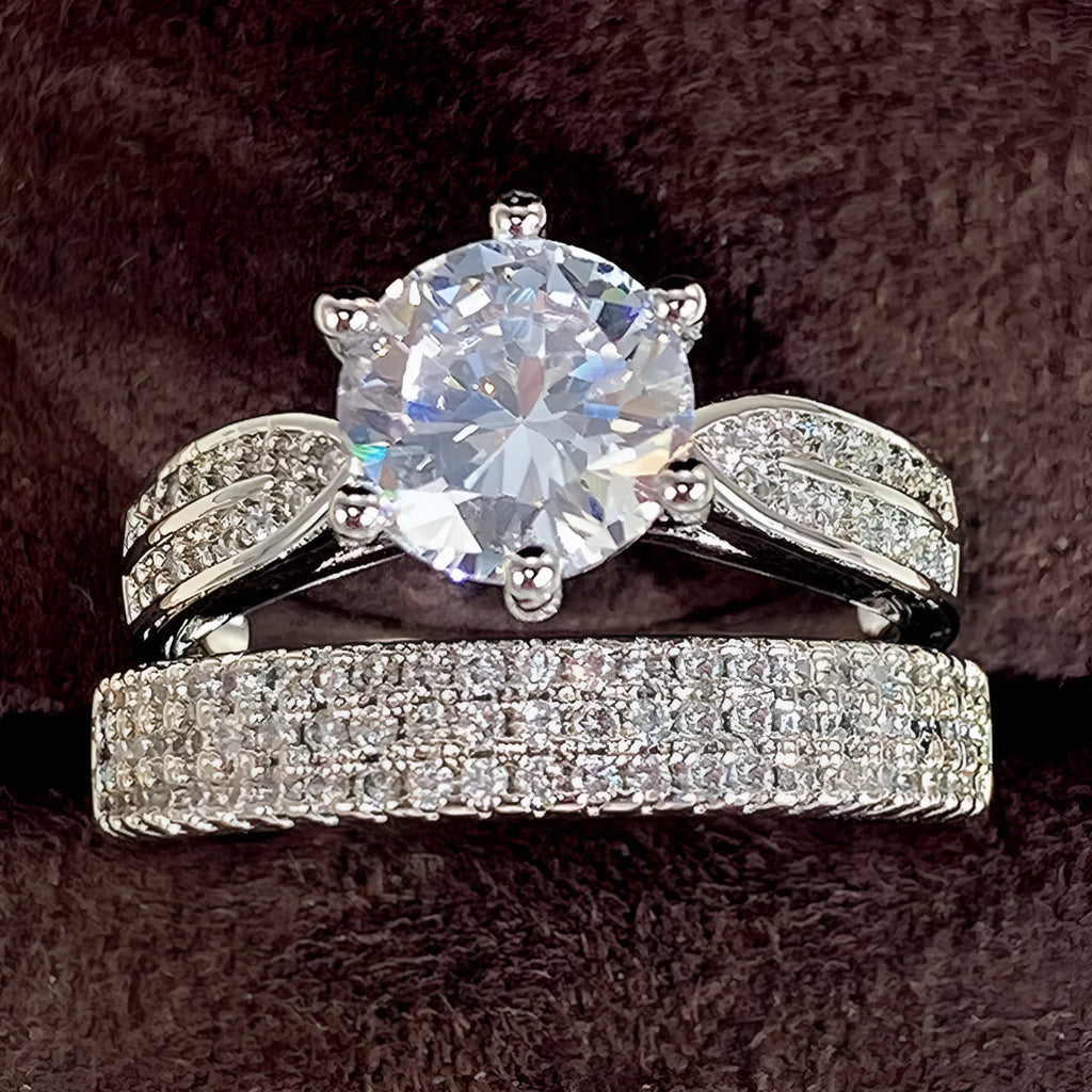 White gold colour alloy geometric wedding ring bracelet on a size chart.
