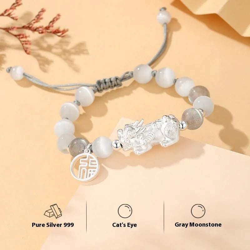 Hand-woven couple bracelet with sterling silver blessing card in black, white, or set, featuring animal and tassel details.