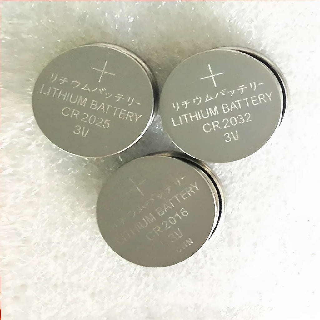 Three alkaline button batteries showing CR2032, CR2025, and CR2016 models with 20mm diameter.