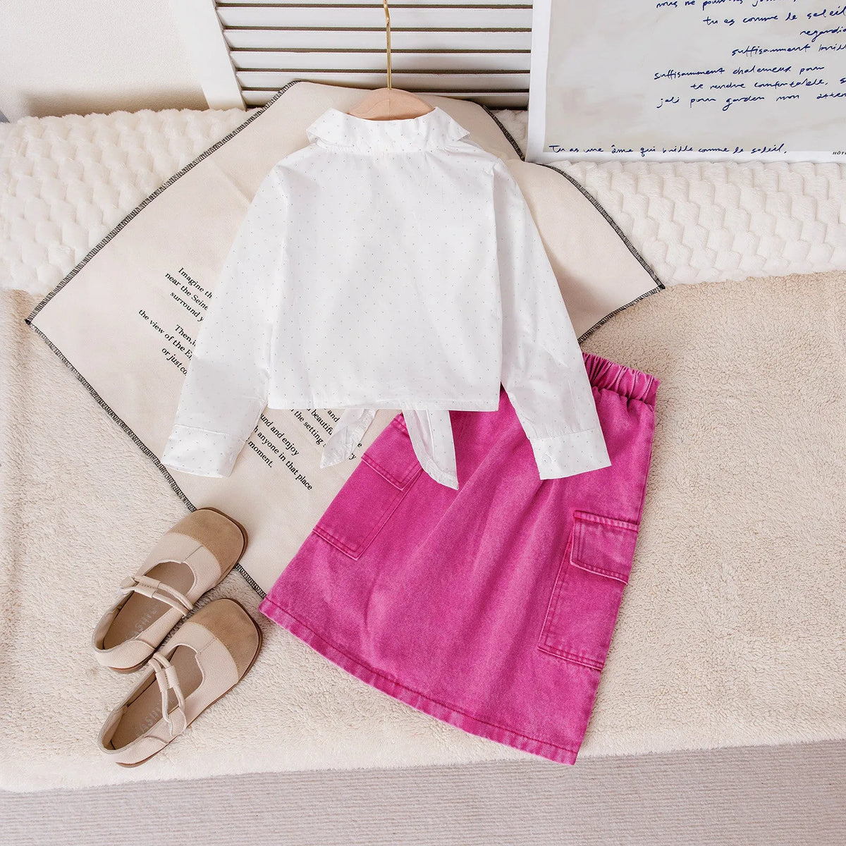 Girls pink cotton knot top and denim shorts set with long sleeves on child model