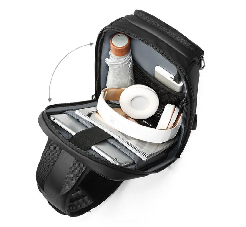 Black PVC outdoor leisure shoulder bag with a single strap, showing dedicated pockets for ID, phone, and computer.