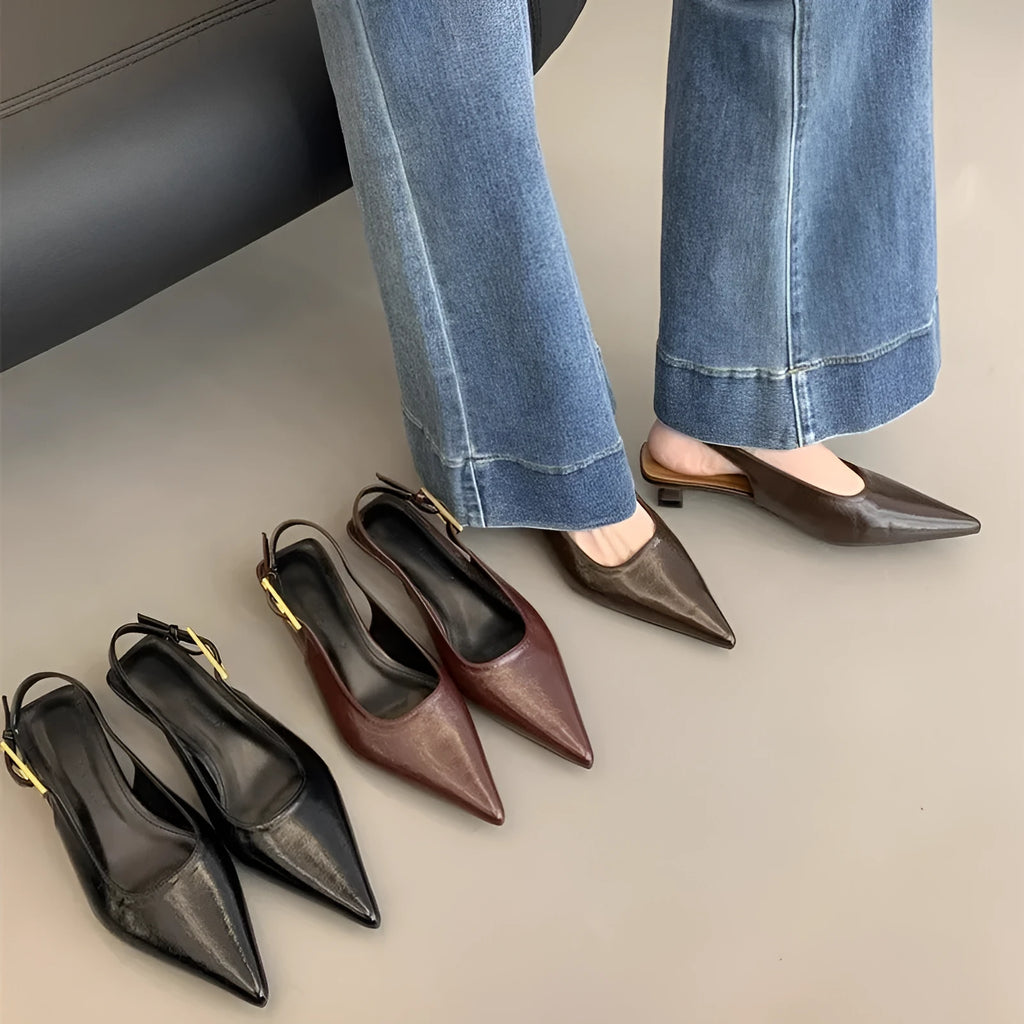 Women's black leather low heel strap shoes with pointed toe and thin rubber soles