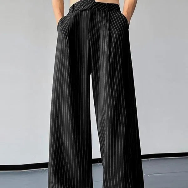 Men's black vertical striped pleated casual trousers showing elastic fabric detail