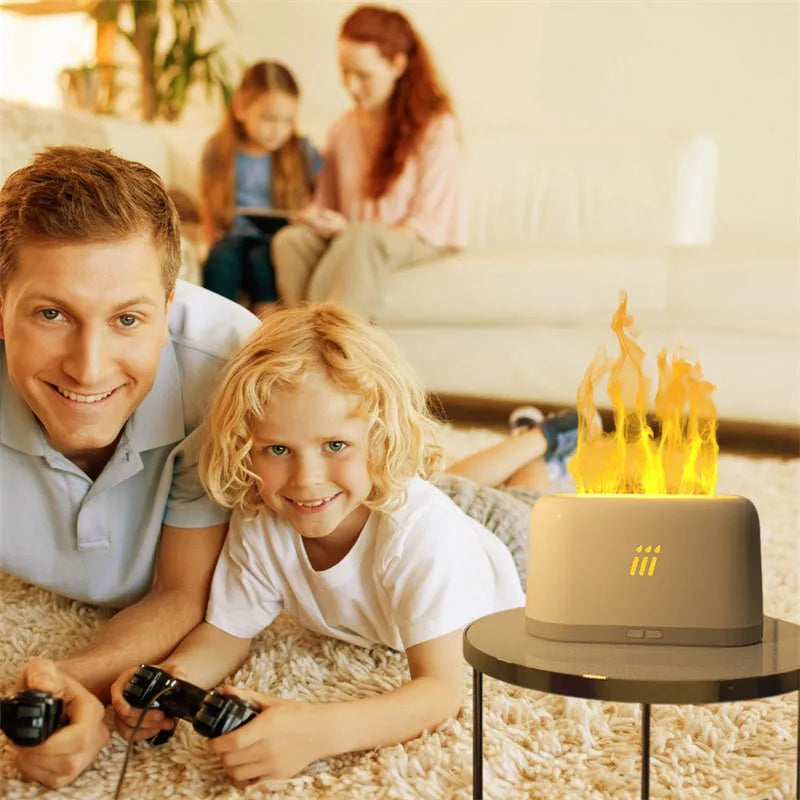 Black ultrasonic aroma diffuser humidifier with LED flame light effect on a wooden table