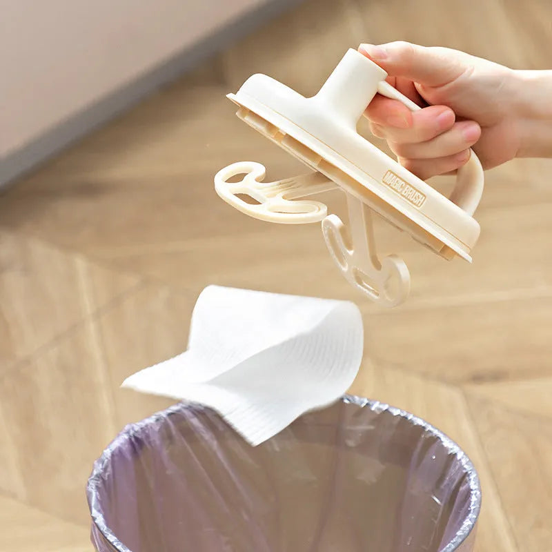 Disposable Magic Cleaning Brush with plastic handle, storage box, and 50 white non-woven fabric rag refills.