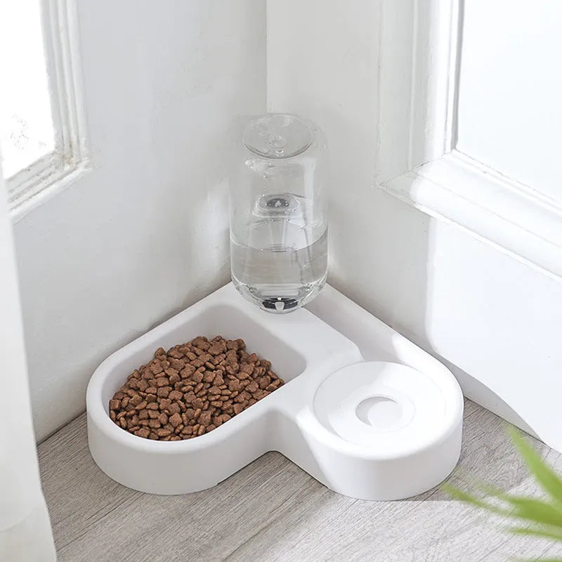 White pet water fountain for cats and dogs with four drinking mode settings.