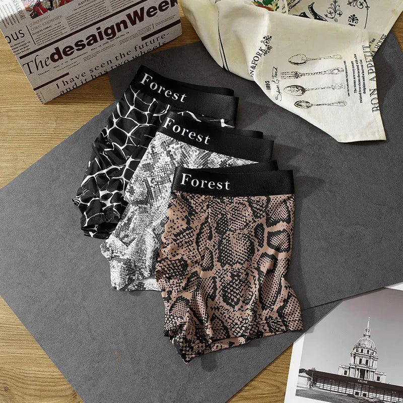 Men's loose fit thin boxer shorts in black, grey, and brown colours, made from quick-dry polyester.