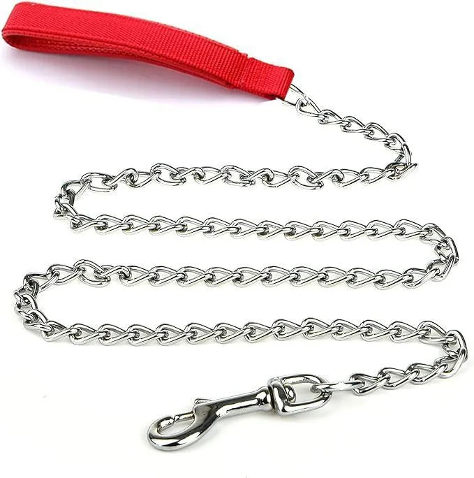 Heavy duty metal dog leash with chew-proof chain and soft black padded handle on a concrete background.