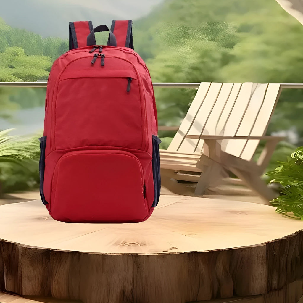 26 inch solid colour foldable backpack in Oxford cloth shown in black, blue, brick red, grey, green, orange, and purple.