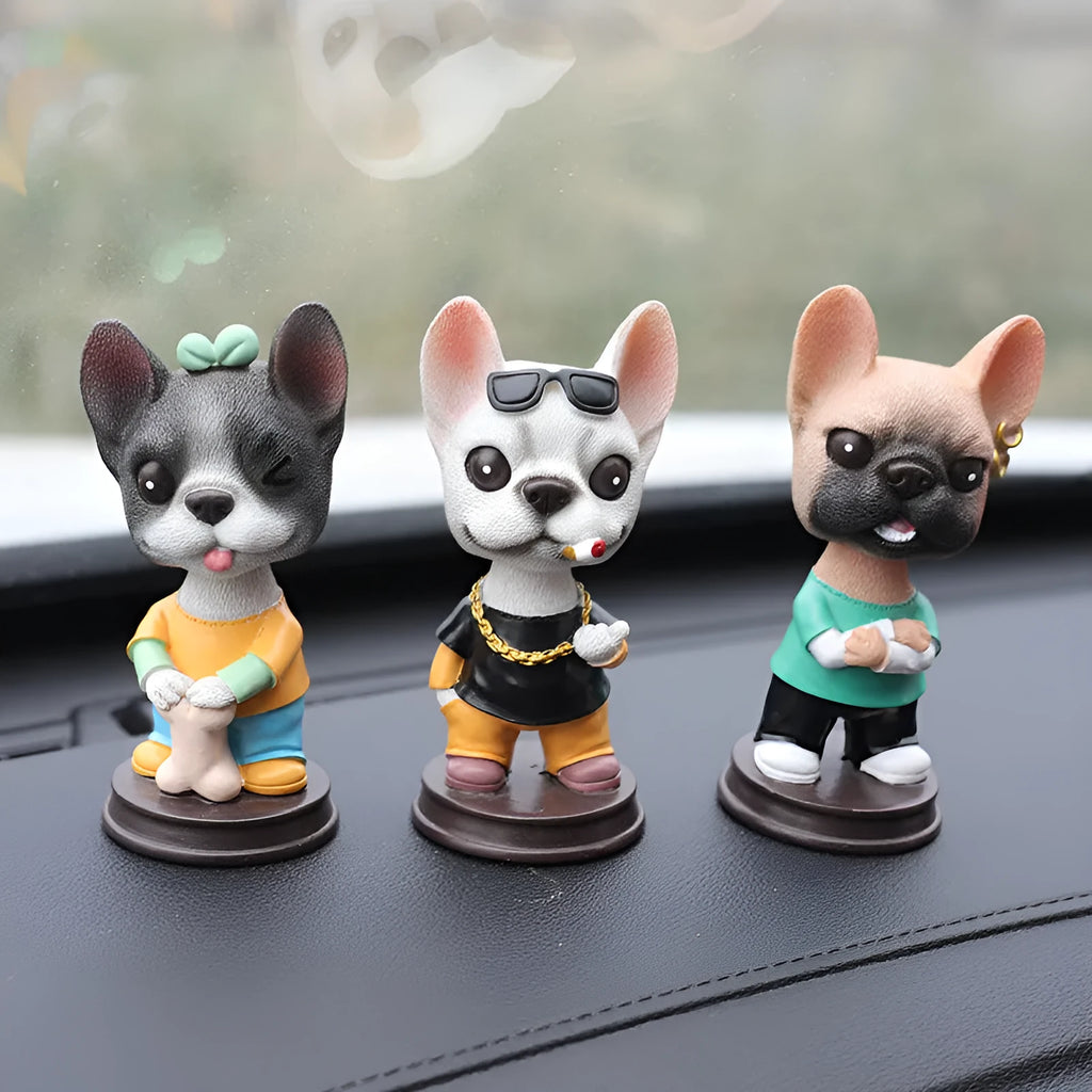 Resin dog car ornament with shaking head, 12cm, in bones style on a car dashboard