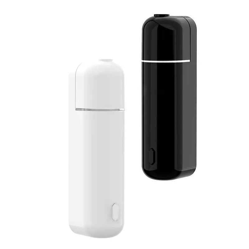 Automatic ultrasonic aroma diffuser in black, wall-mounted with single mist outlet, battery powered, 0.5L capacity