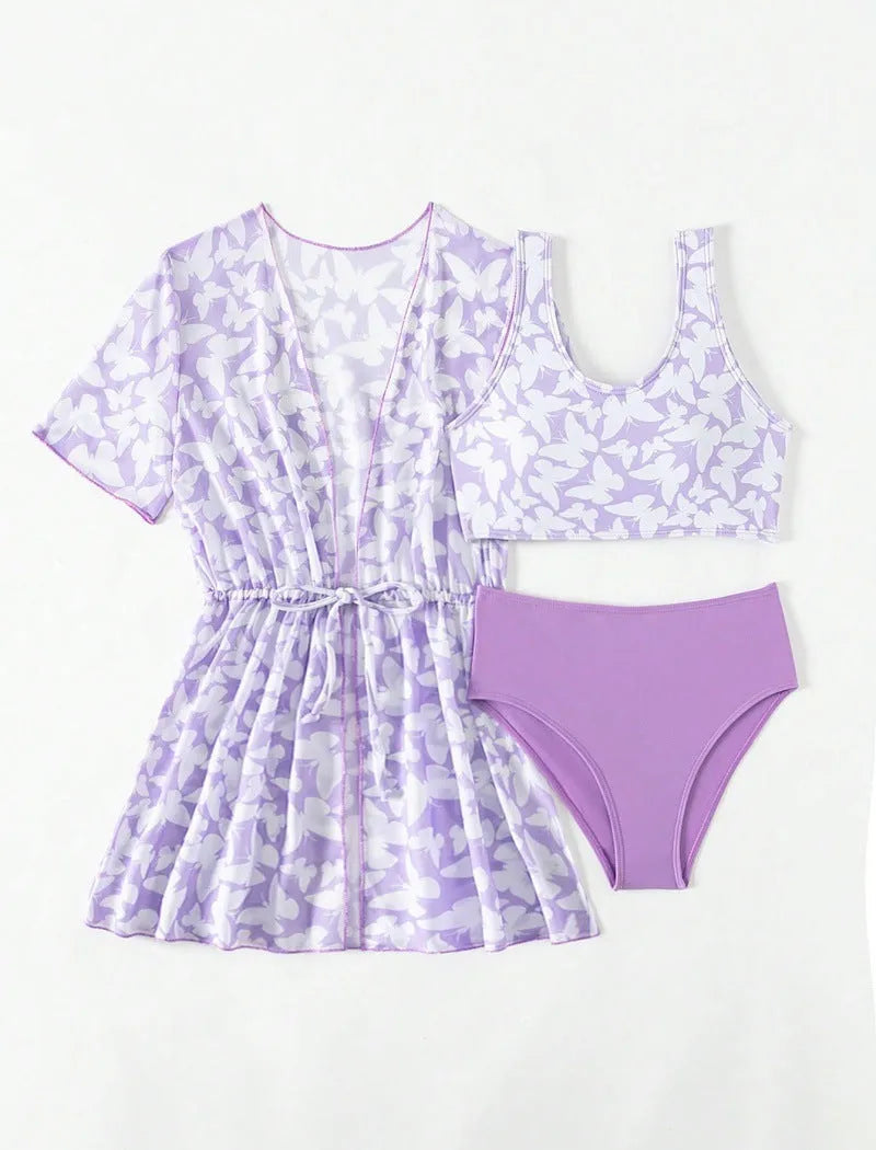 Three piece girls swimsuit set in colour 3218, showing coat, vest and pants.
