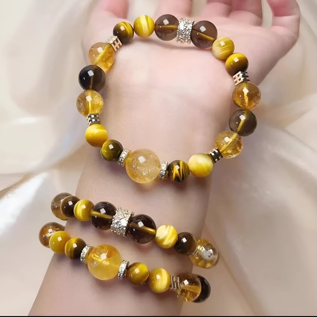 Close-up of a natural yellow artificial crystal bead bracelet with 10mm tower-shaped beads on a string.