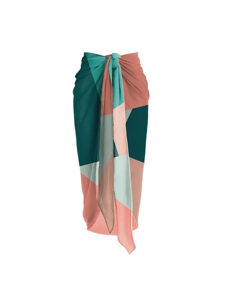 Women's two-piece bikini set with a matching mesh gauze skirt in contrast colours.