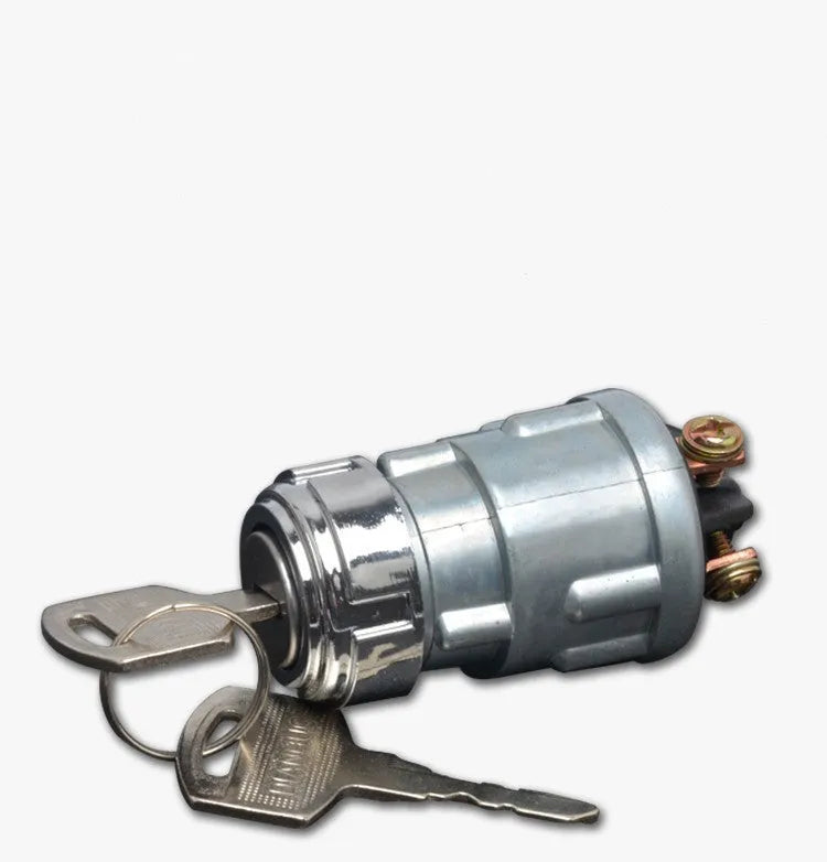 Copper vehicle ignition switch with key for trucks and forklifts.