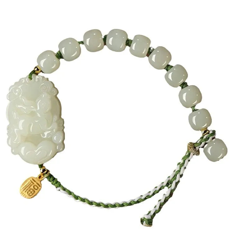 Hetian jade rabbit zodiac bracelet with S925 silver charm on red ice cotton rope