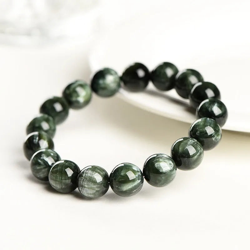Green Dragon Crystal bracelet with 8-9mm geometric round beads and Ruyi design.