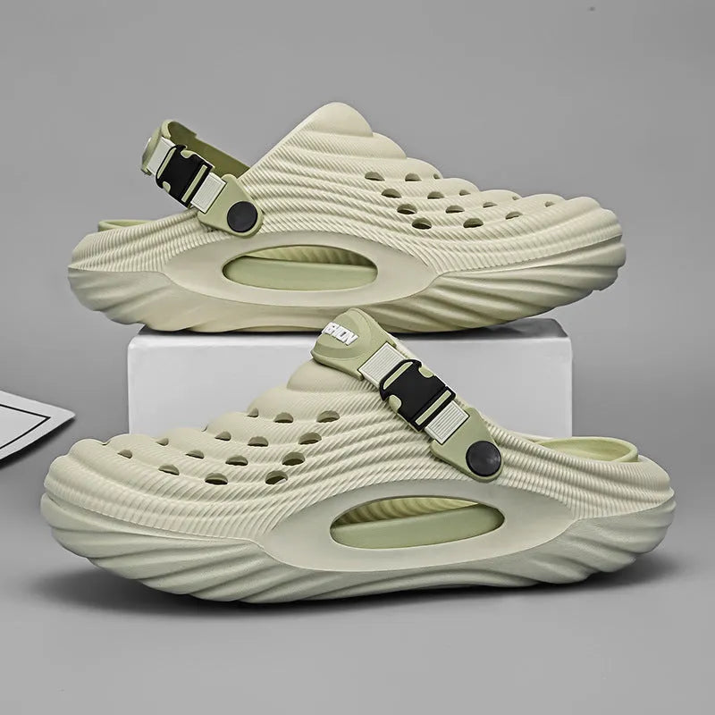 Men's solid colour EVA foam platform slippers with hollow-out pattern, shown in light green.