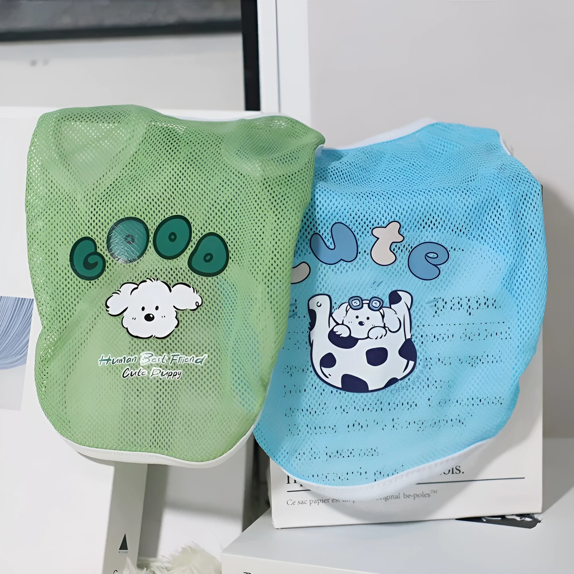 Spring summer grid cartoon printed polyester pet vest in blue, shown on a small dog, size range XS to 6XL