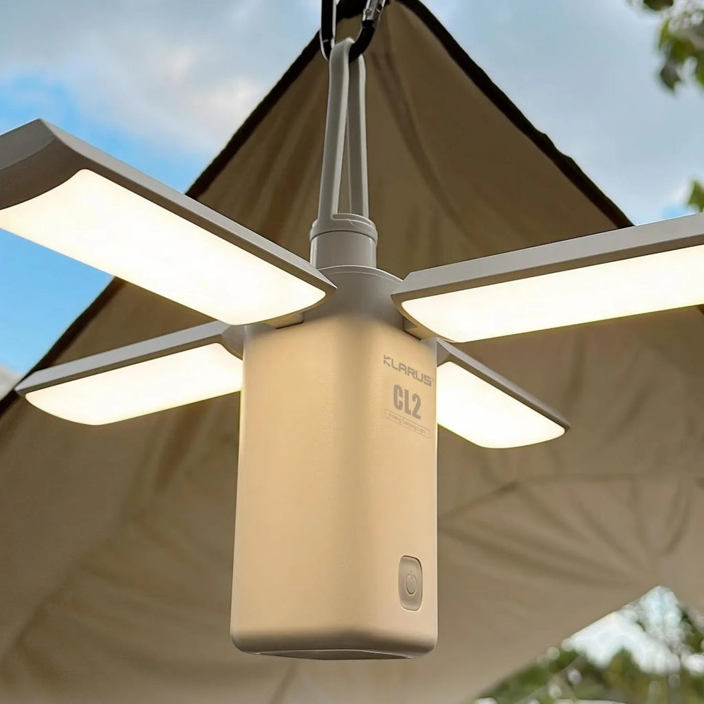 Rechargeable green and white LED campsite lamp with USB charging cable.