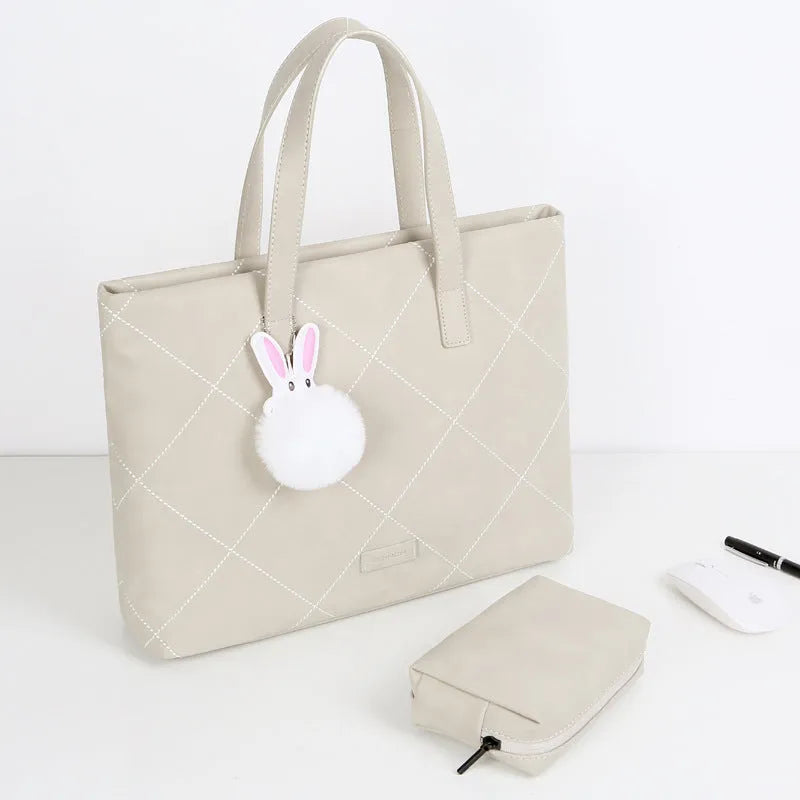 Genuine leather crossbody laptop bag in light gray with nylon lining for 13 to 15 inch laptops