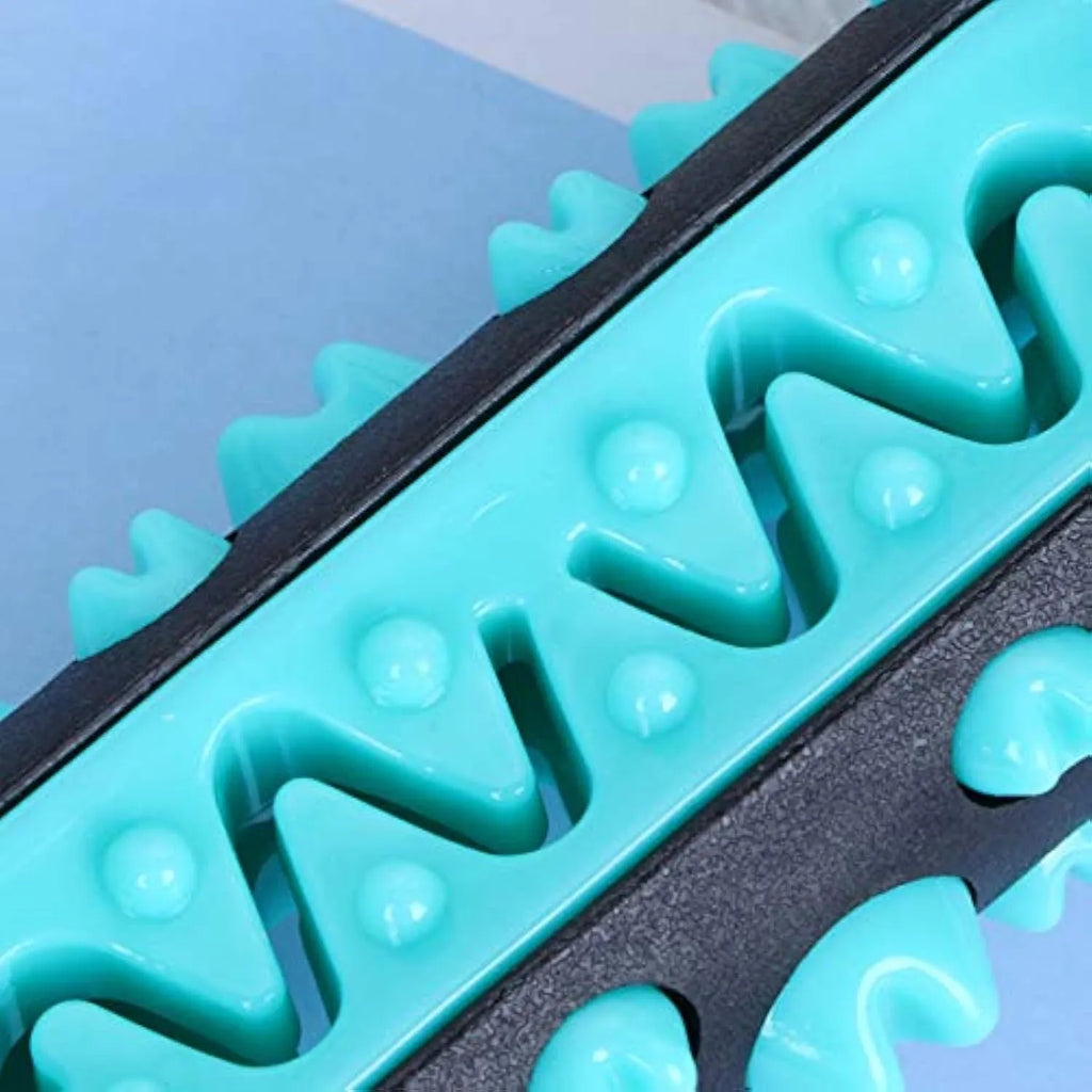 Natural rubber dog dental chew toy with cleaning nubs in blue, green, yellow, and black blue.