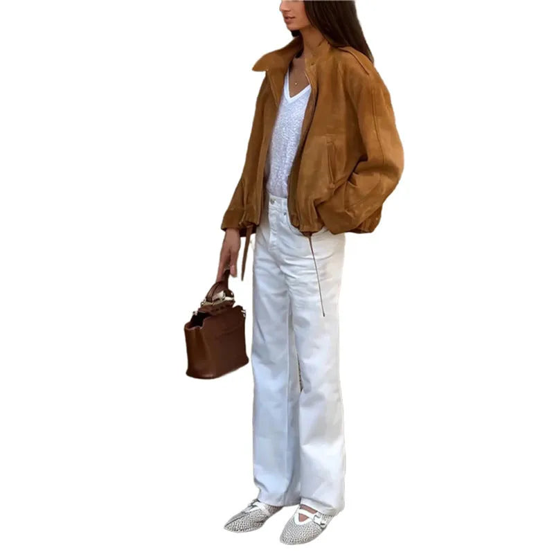 Man wearing a solid colour retro loose-fit polyester jacket.