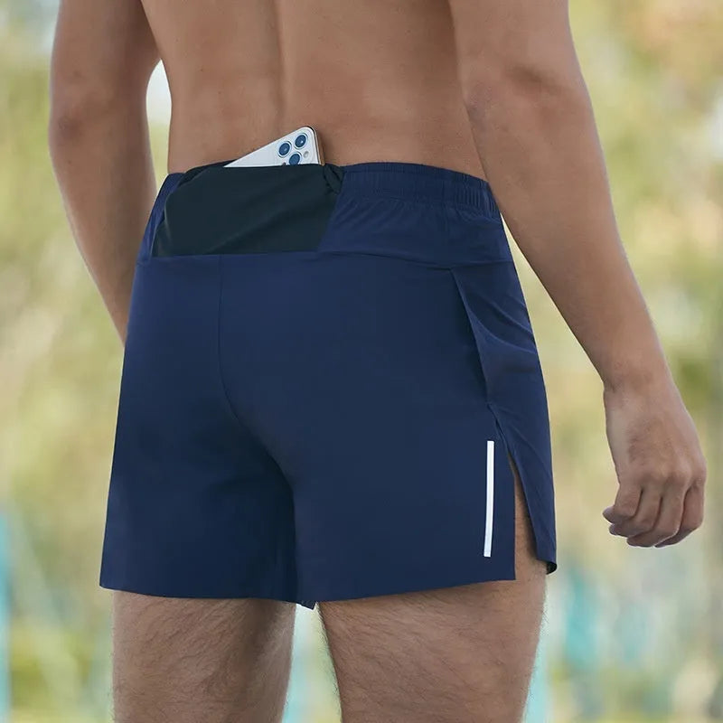 Men's black high-waist off-road running shorts with a loose, breathable fit.